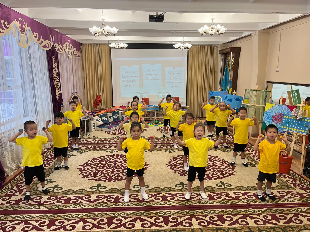 Аэробика "Асық" биі  "Аққу" тобының тәрбиеленушілерімен